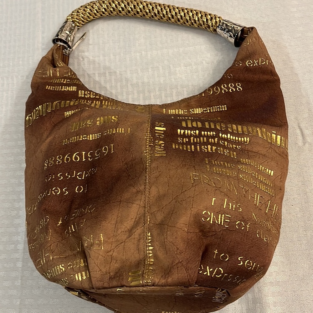 Brown & Puffed Gold writing handbag. Beautiful handle & hardware No brand